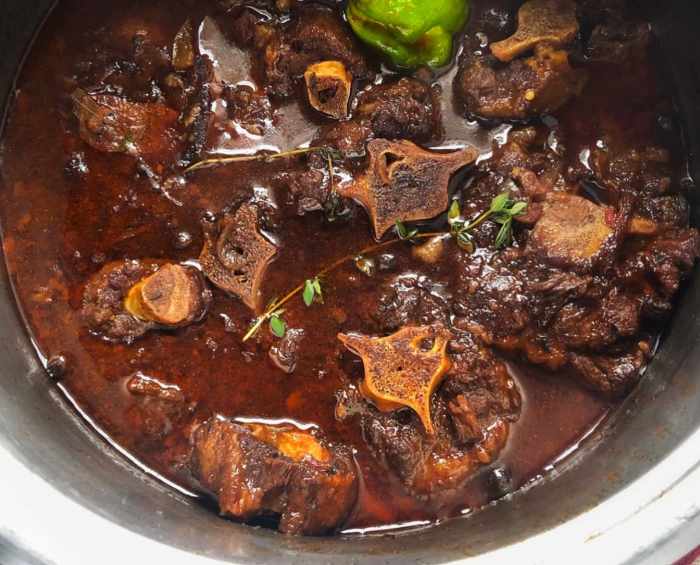 Oxtail jamaican delicious islands food caribbean oxtails jamaica dishes dinner dish traditional island meat tradition rice peas tail ox recipe